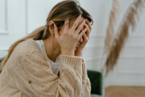 A woman worrying about her narcissistic spouse
