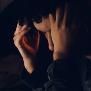 A confused woman after experiencing gaslighting